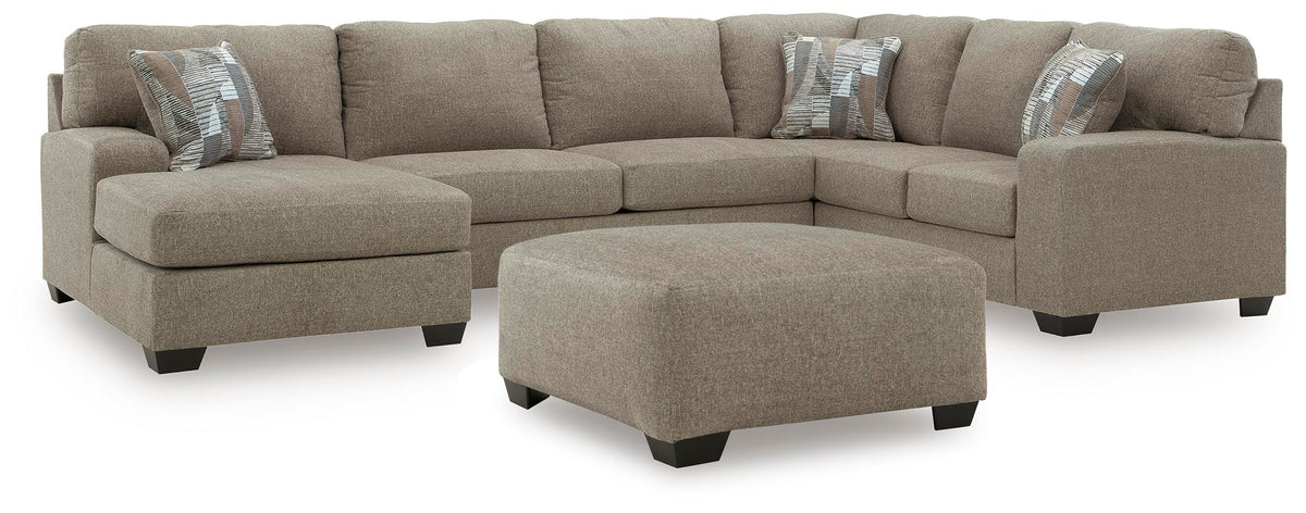 Newellen 3-Piece Sectional and Oversized Ottoman (48404-SI)
