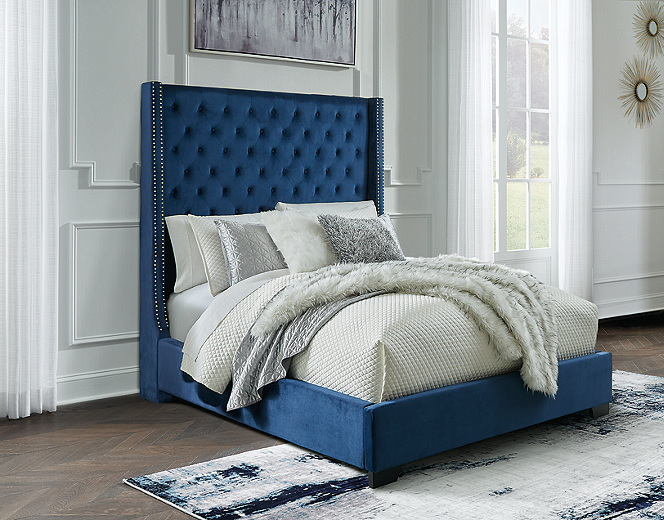 Blue velvet upholstered bed deals