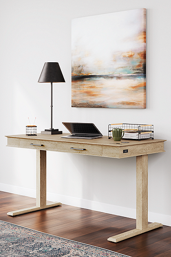 Adjustable height desk clearance with drawers